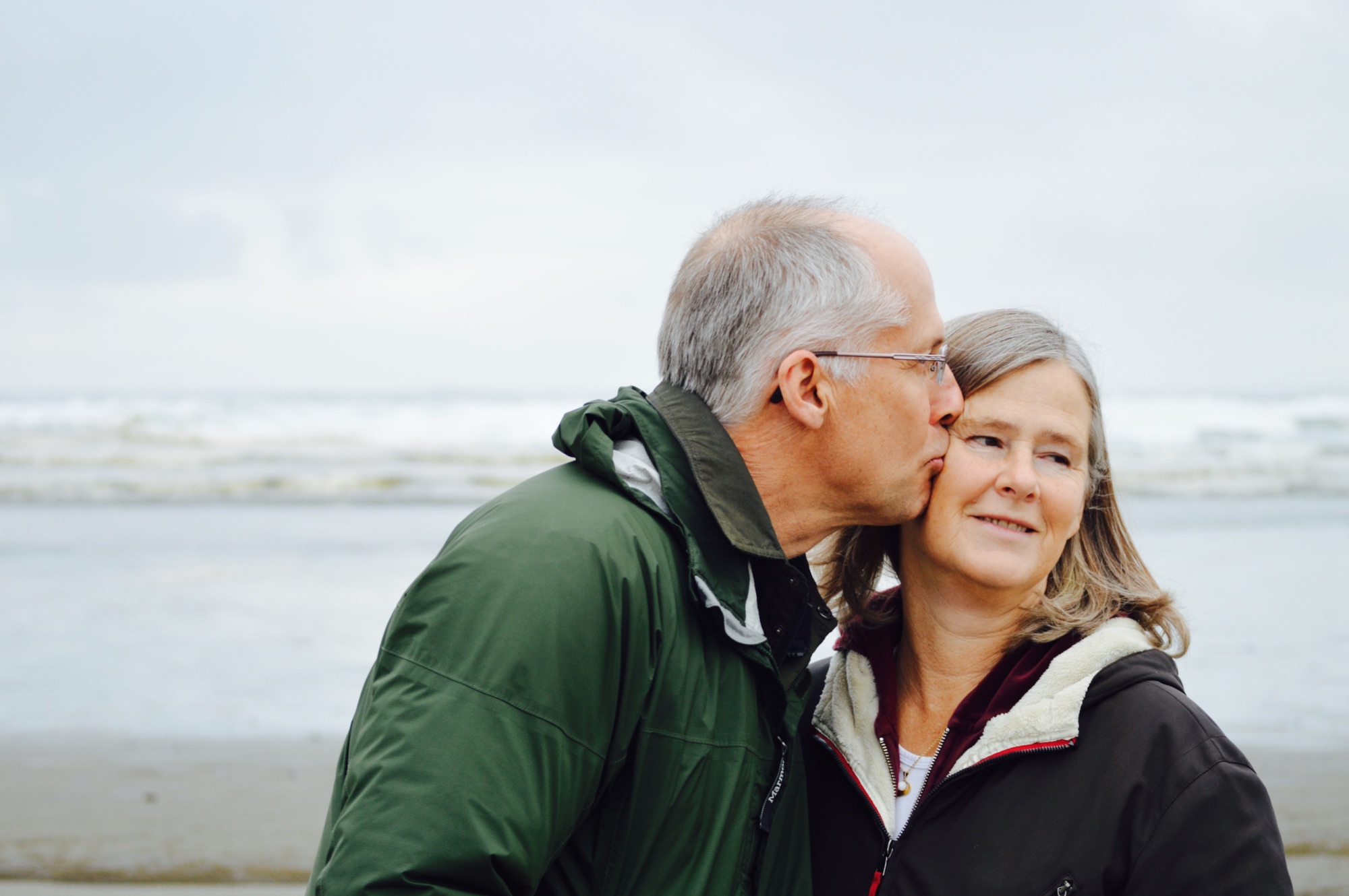 A couple enjoying time together by the ocean